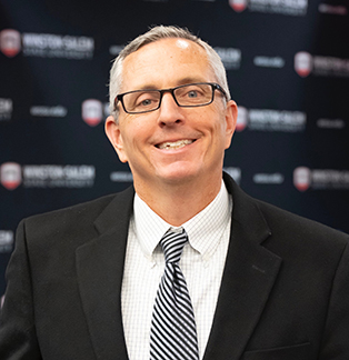 Dr. Russel M. Smith